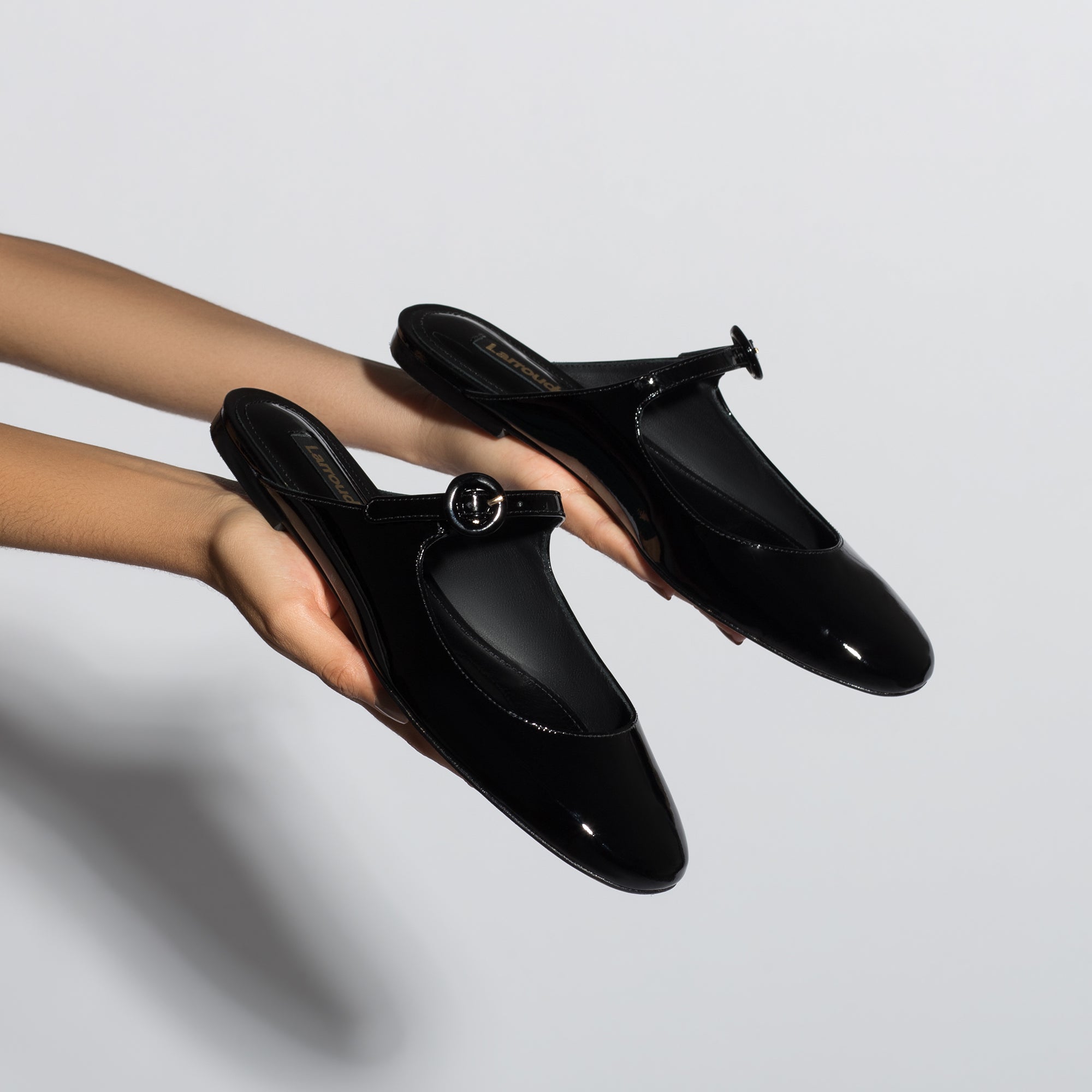 Blair Flat Mule In Black Patent Leather